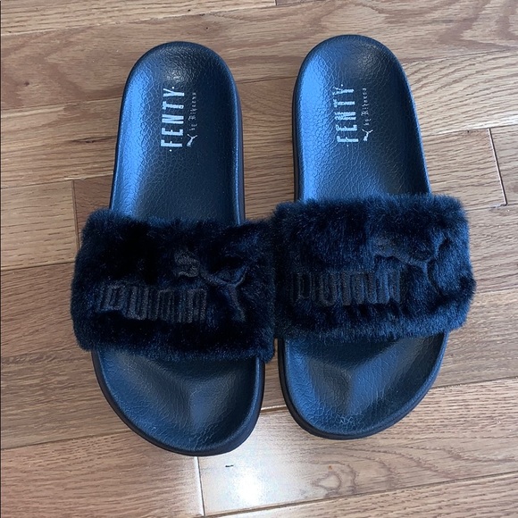 black furry puma slides